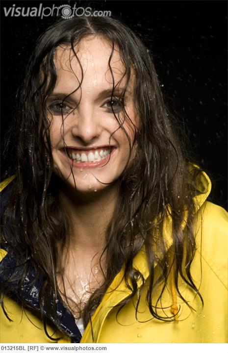 young woman in rain with wet hair and smeared make-up